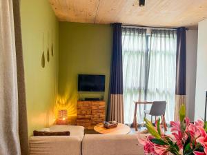 Your peaceful getaway at Paje Beach in a one-bedroom flat with large terrace and pool