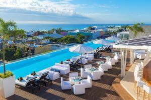 The Fives Downtown Hotel & Residences, Curio Collection by Hilton