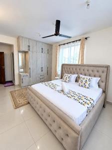 Crowne Paradise Homes Tausi Residence a Luxury Spacious 3-Bedroom Apartment in Nyali Mombasa