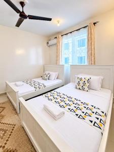 Crowne Paradise Homes Tausi Residence a Luxury Spacious 3-Bedroom Apartment in Nyali Mombasa