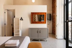 Loft #101 en centro histórico con balcones y terraza común
