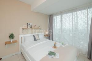 Apartemen Grand Kamala Lagoon Apartment By BoboRoom