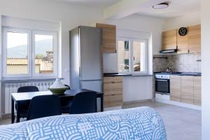GuestHost - Bright and Modern Apartments in Lucca