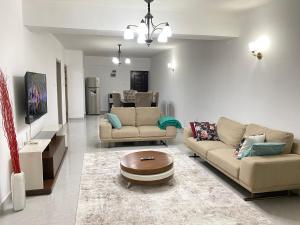 City View Escape- Spacious 3BR Apt near Yaya Centre