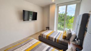 KI Condo E202 - 3 Habitaciones en el Corazón de la Bahía - Alberca, Billar