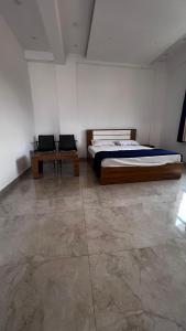 Nk rooms vellamunda