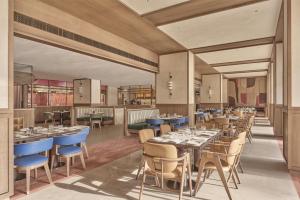 Slohh by Roach Bengaluru, Curio Collection by Hilton
