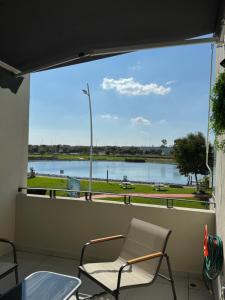 Bello departamento con atardeceres frente al lago - Zakia