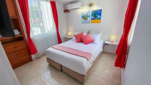Apartamento con piscina y tobogán cerca a la playa