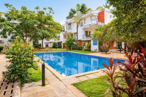 Manzel - Sunlit 2BR Villa, Walk to Candolim Beach