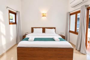 Manzel - Sunlit 2BR Villa, Walk to Candolim Beach