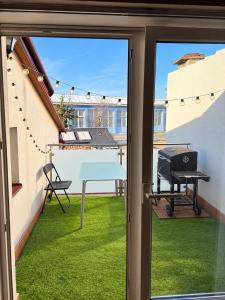 Cozy Attic Apartment with Private Balcony & BBQ