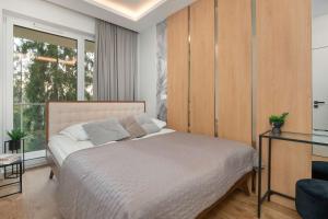 Comfortable Apartment with Air Conditioning and Parking by Noclegi Renters