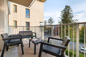 Comfortable Apartment with Air Conditioning and Parking by Noclegi Renters