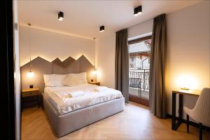 Apartamenty z oddzielną sypialnią - parking w cenie - IZBY PODHALAŃSKIE