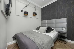 Przestronny Apartament z Sauną i Tarasem by Noclegi Renters