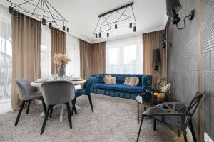 Przestronny Apartament z Sauną i Tarasem by Noclegi Renters