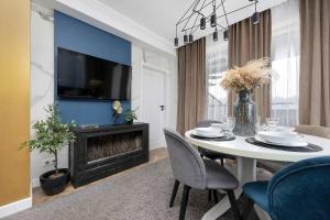 Przestronny Apartament z Sauną i Tarasem by Noclegi Renters
