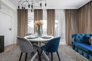 Przestronny Apartament z Sauną i Tarasem by Noclegi Renters