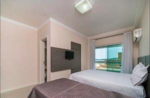 Apartamento poucos passos da praia