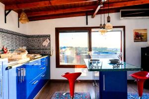 The Blue Wood Penthouse