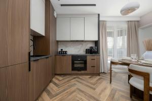 Unique apartments with private sauna and parking in Kielce Aleja Solidarności 32 by Heyrent