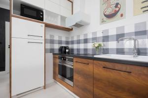 Family apartment with air-conditioning in Warsaw Międzynarodowa 31 by Heyrent