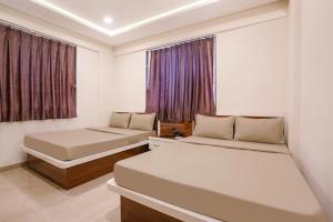 FabHotels Aurelith Residency