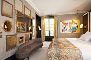 Hotels Le Pavillon de la Reine & Spa : photos des chambres