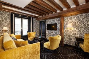 Hotels Le Pavillon de la Reine & Spa : photos des chambres