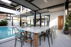 Sleek 4BR Skyline Oasis Sunset Garden 5 Pool Villa with Private Salt Pool near Nai Harn
