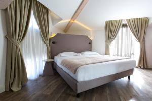 Al Campanile Aparthotel & Suite