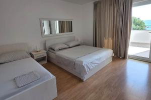 Apartments by the sea Zivogosce - Mala Duba, Makarska - 18626