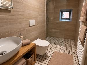 Apartmány U Kostela