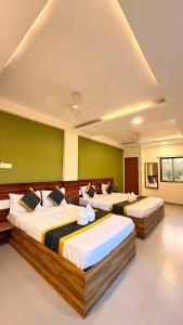 Lotus Grand Nagaon By Vintara Stays