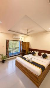Lotus Grand Nagaon By Vintara Stays
