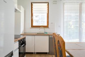 Wola Kasprzaka Homely Apartment by BookingHost