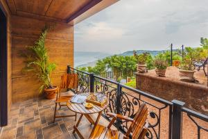 ELIVAAS Curated The Cowboy Castle 7BHK Hill Villa with Valley & Dam Views, Lawn, Gazebo & Gaming Room