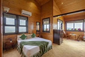 ELIVAAS Curated The Cowboy Castle 7BHK Hill Villa with Valley & Dam Views, Lawn, Gazebo & Gaming Room