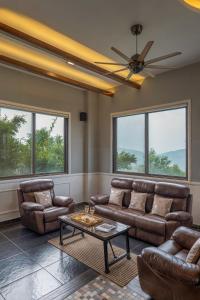 ELIVAAS Curated The Cowboy Castle 7BHK Hill Villa with Valley & Dam Views, Lawn, Gazebo & Gaming Room