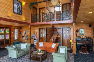 ELIVAAS Curated The Cowboy Castle 7BHK Hill Villa with Valley & Dam Views, Lawn, Gazebo & Gaming Room