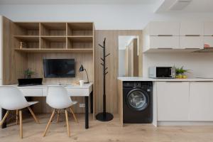 Comfortable Studio with Workspace in Warsaw by Heyrent