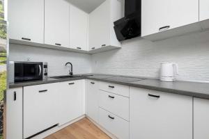 Dwupoziomowy Apartament Blisko Dworca by Heyrent