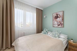 Przytulny Apartament Niedaleko Plaży i Centrum Kołobrzegu by Heyrent