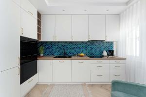 Przytulny Apartament Niedaleko Plaży i Centrum Kołobrzegu by Heyrent