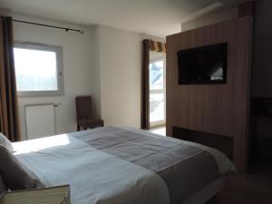 Hotels Au Moulin des Ecorces : photos des chambres