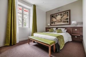 Hotels Hotel-Cafe du Trinquet : photos des chambres