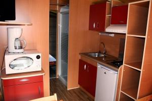 Complexes hoteliers Camping La Pinede : photos des chambres