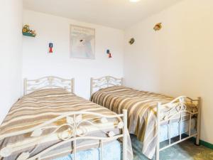 Maisons de vacances Charming holiday home in a green setting : photos des chambres