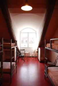 Bed in 6-Bed Mixed Dormitory Room room in Attic Hostel Torino